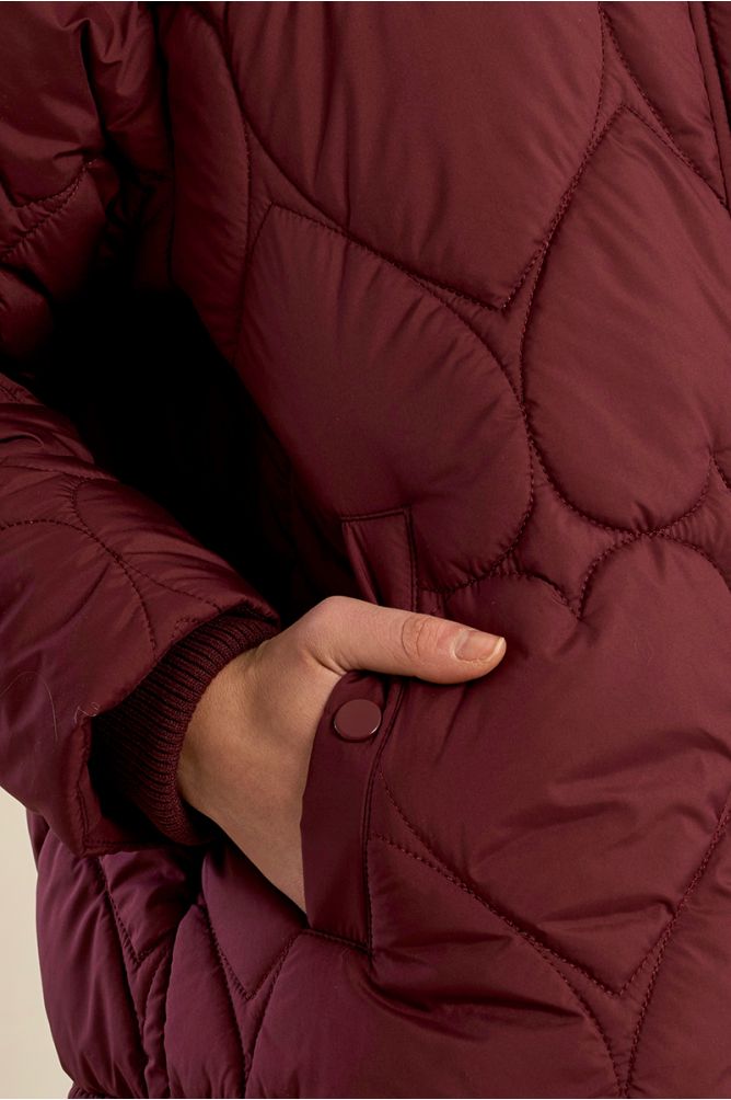 Doudoune matelassée à motif cœur
