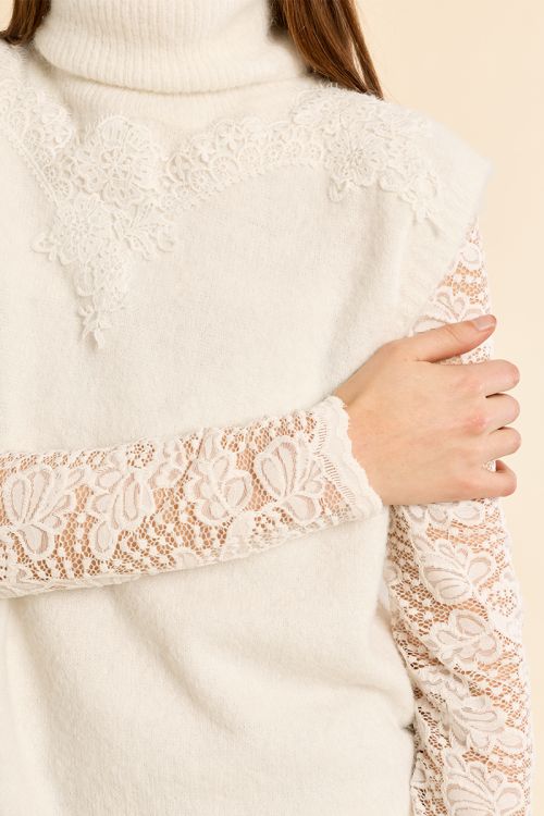 Pull sans manches, col roulé brodé