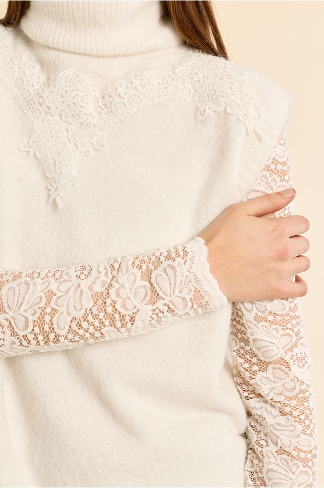 Pull sans manches, col roulé brodé