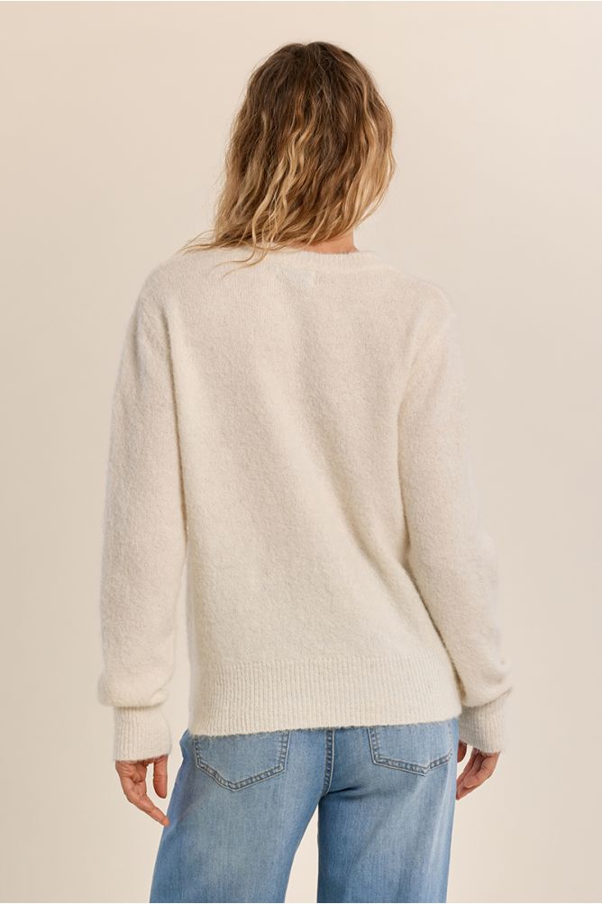 Pull duveteux strassé