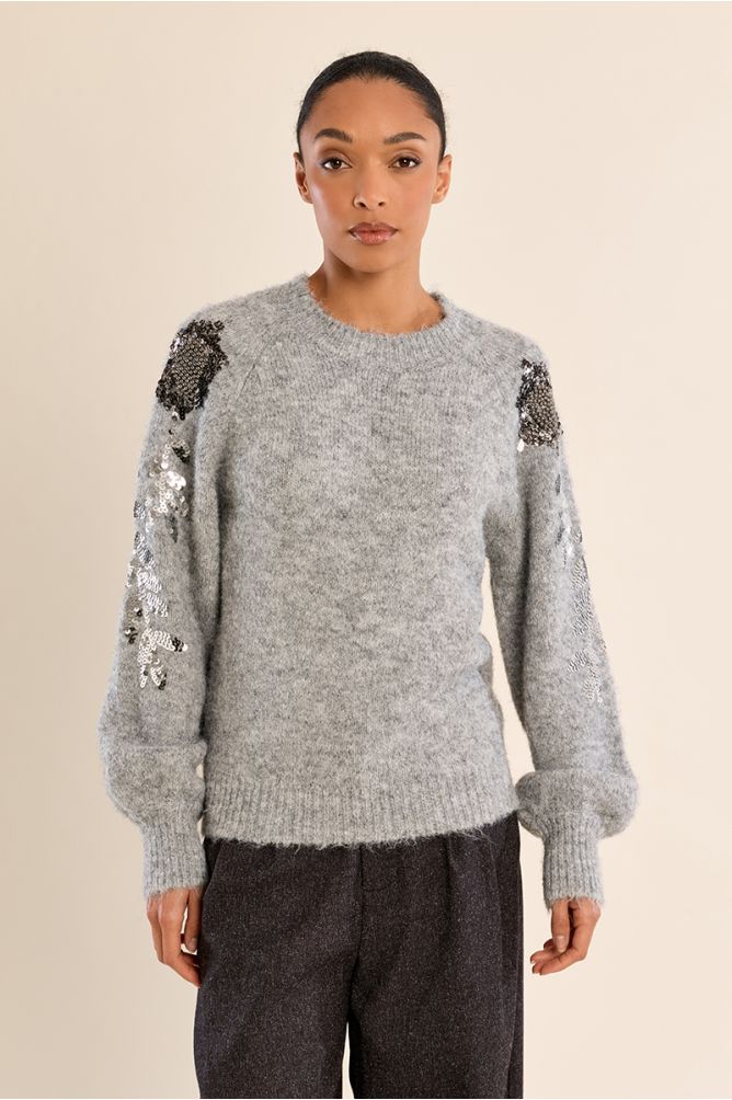 Rhinestone sweater on the sleeves