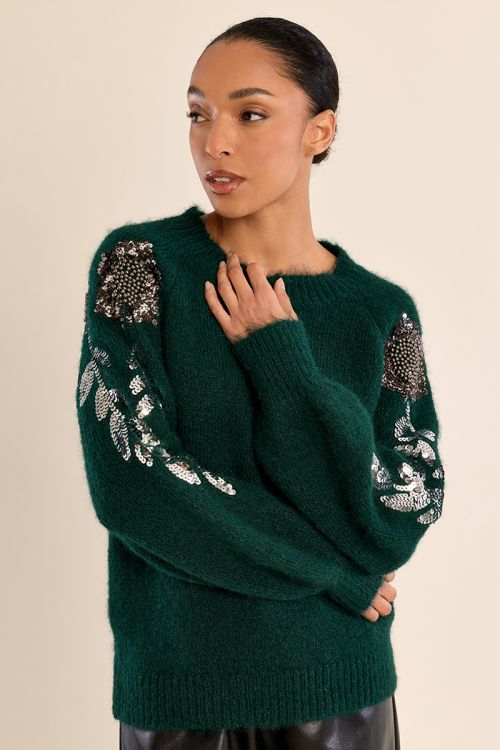 Rhinestone sweater on the sleeves