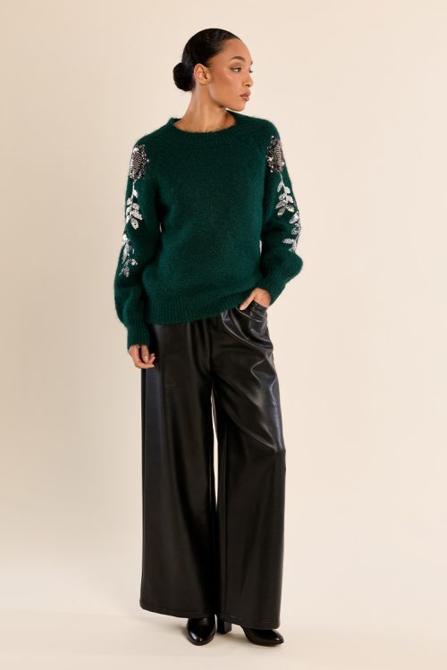 Rhinestone sweater on the sleeves