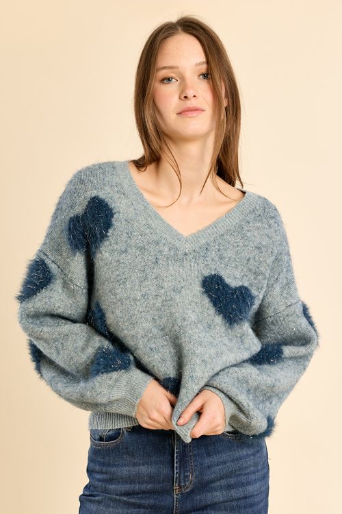 Fluffy sweater with iridescent hearts
