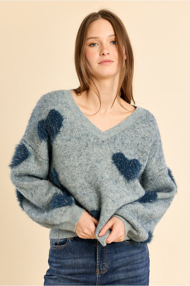 Fluffy sweater with iridescent hearts