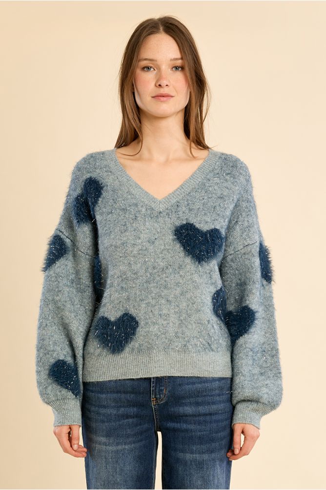 Fluffy sweater with iridescent hearts