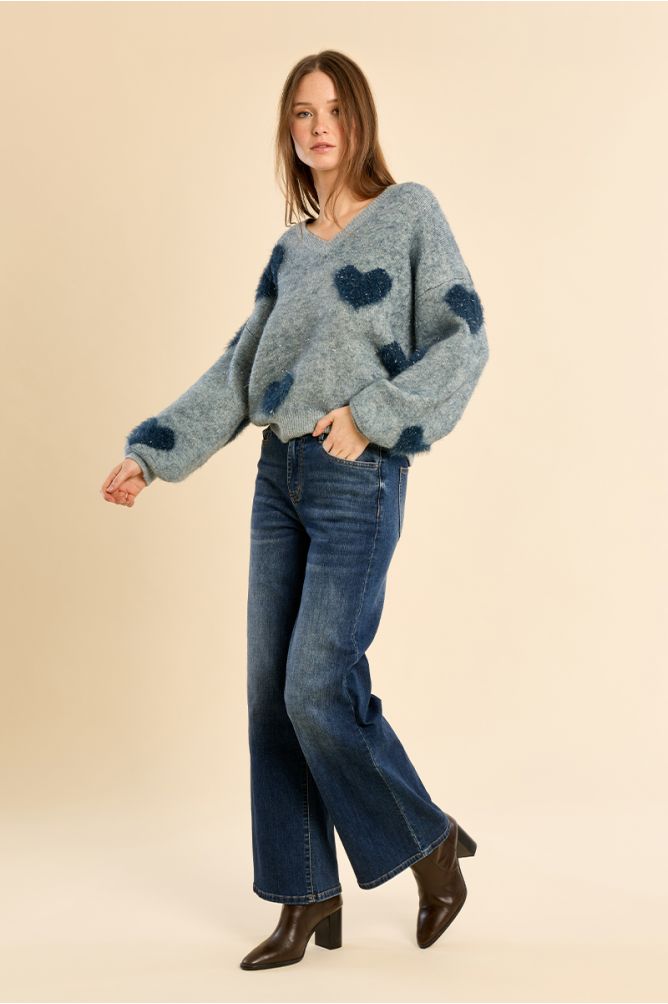 Fluffy sweater with iridescent hearts