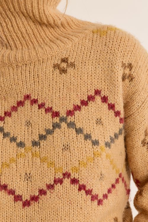 Pull en maille col roulé, à motif