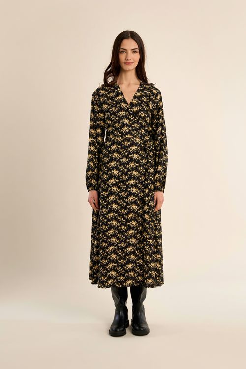 Vestido largo con estampado y volantes