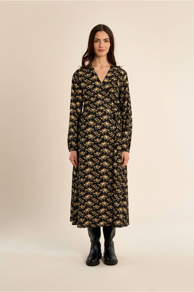 Vestido largo con estampado y volantes