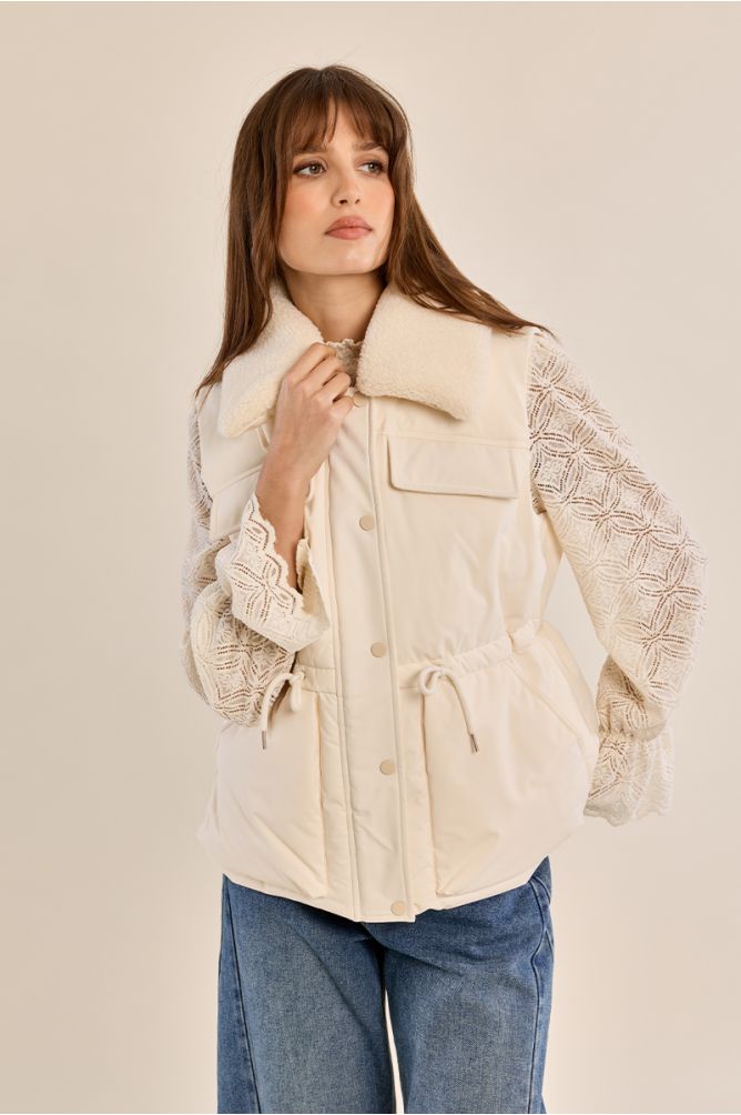Quilted vest with a plush collar