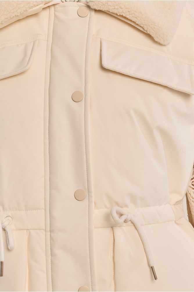Quilted vest with a plush collar