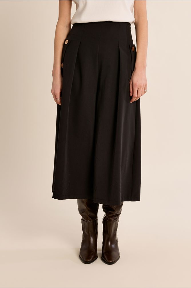 Pantalón midi perneras anchas