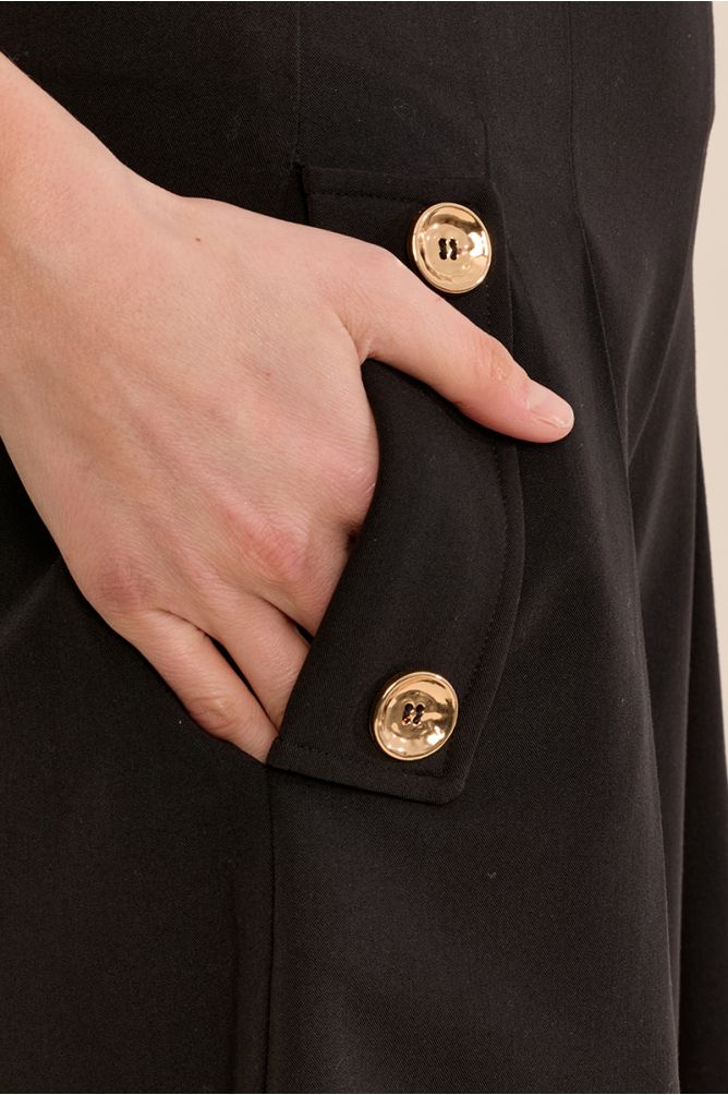Pantalón midi perneras anchas