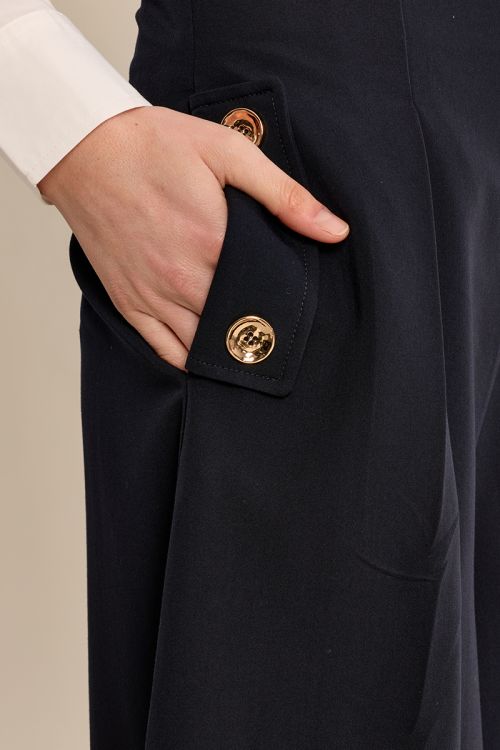 Pantalón midi perneras anchas