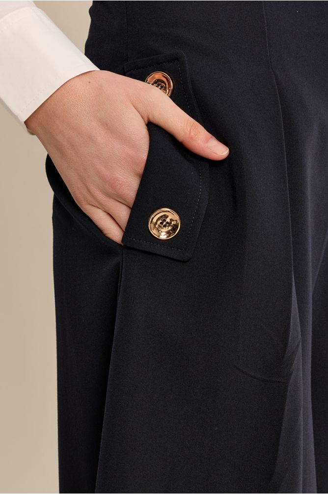 Pantalón midi perneras anchas