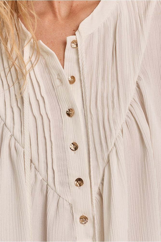 Flowing knotted blouse