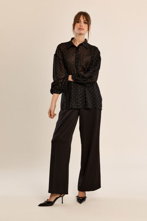 Blouse à pois en semi-transparence