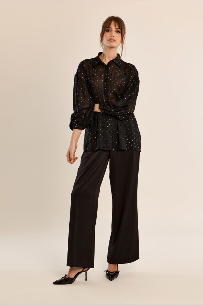 Blouse à pois en semi-transparence