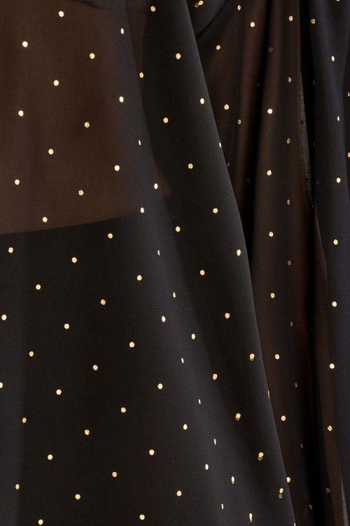 Blouse à pois en semi-transparence