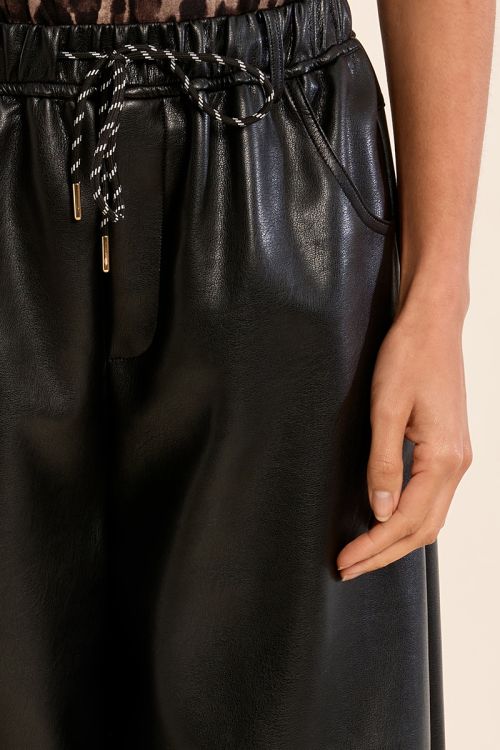 Pantalon évasé en simili-cuir