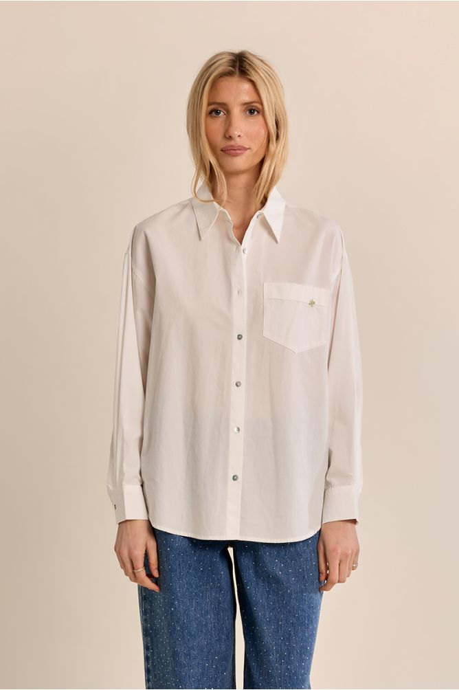 Camisa de manga larga bolsillo frontal