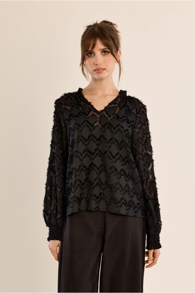 Blouse semi-transparente, col V