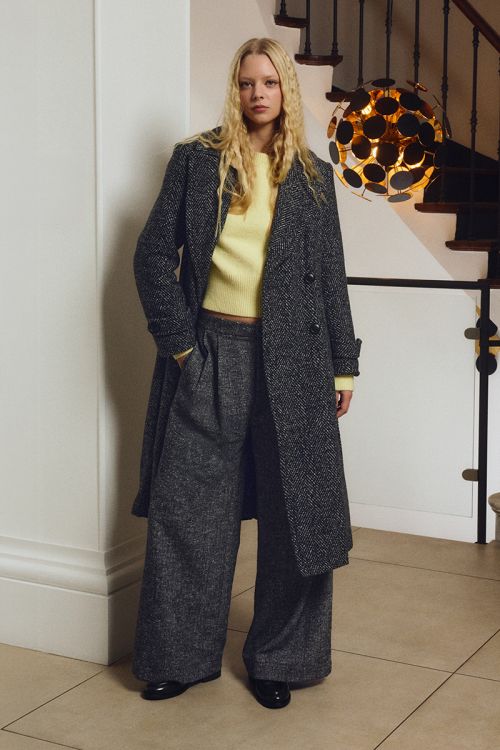 Flared pleated trousers
