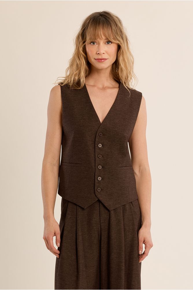 Sleeveless blazer with buttons