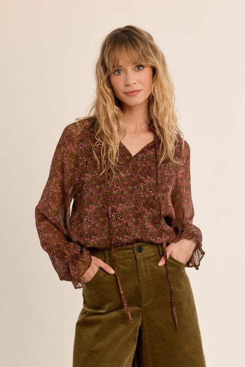 Semi-transparent floral blouse