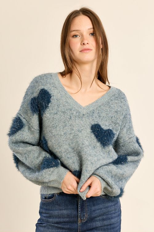 Fluffy sweater with iridescent hearts