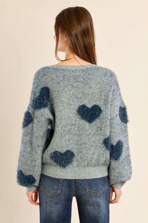 Fluffy sweater with iridescent hearts