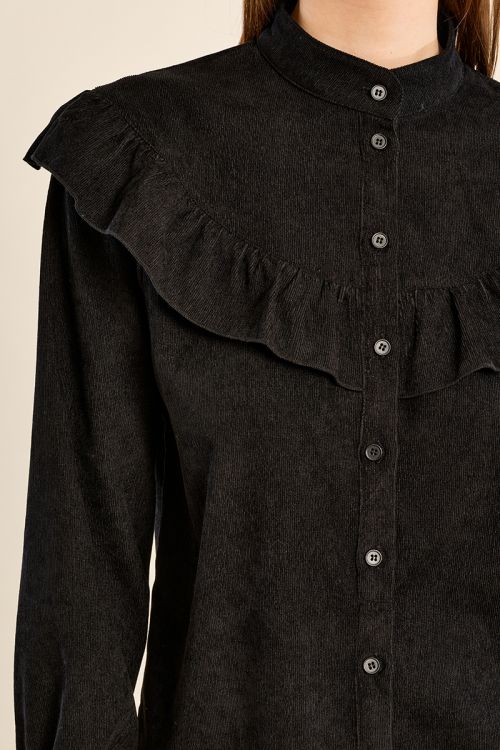 Blouse col montant volantée