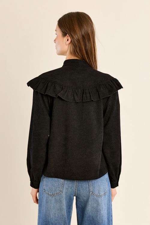 Blouse col montant volantée
