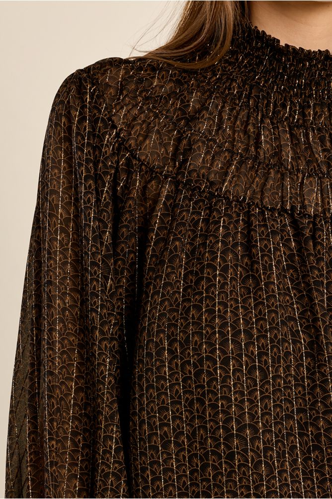 Semi-sheer ruched blouse
