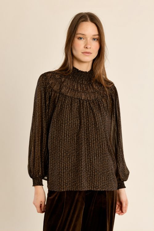 Semi-sheer ruched blouse