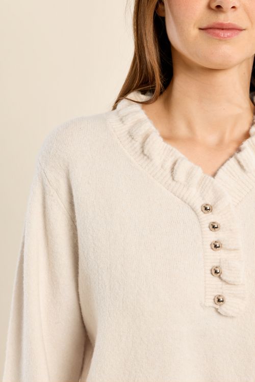 Pull en maille col volanté
