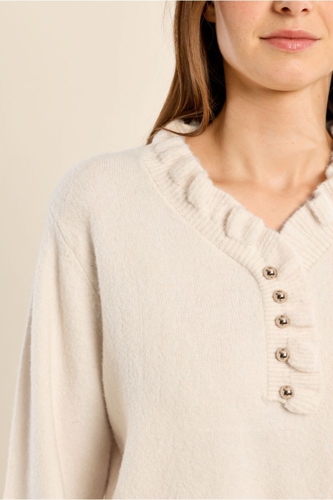 Knitted sweater with ruffled collar