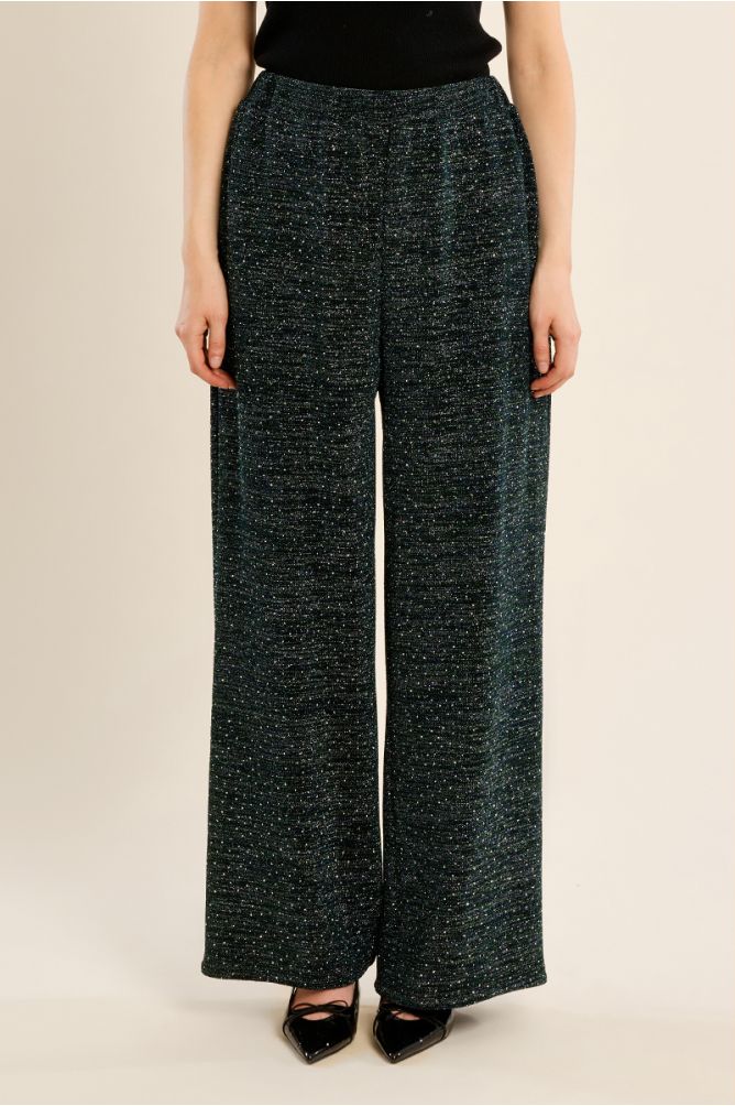 High-waisted trousers, studded with rhinestones