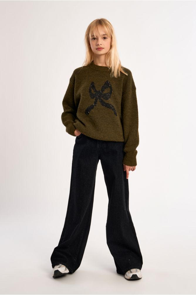 Pantalón vaquero con perneras anchas