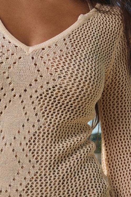 Vestido ajustado, de manga larga, crochet.