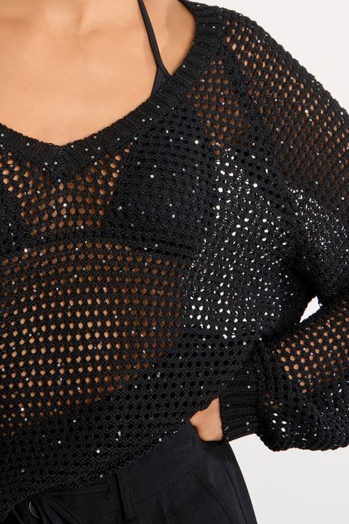 Jersey de mujer de manga larga, en punto acanalado.