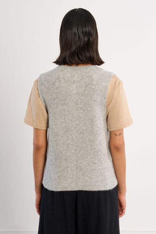 Sleeveless cardigan, buttoned
