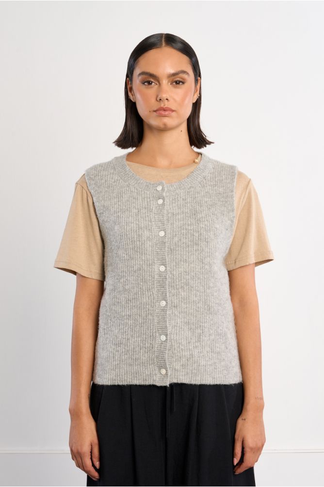 Sleeveless cardigan, buttoned