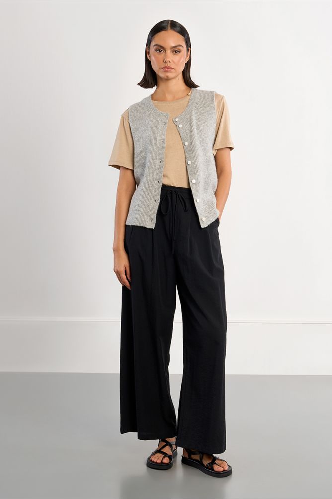 Sleeveless cardigan, buttoned