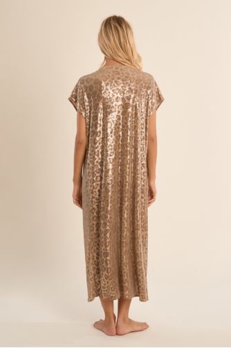 Chaqueta de mujer larga, en tejido brillante, con flecos y estampado.