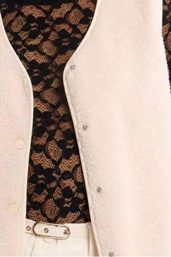 Short sleeveless jacket