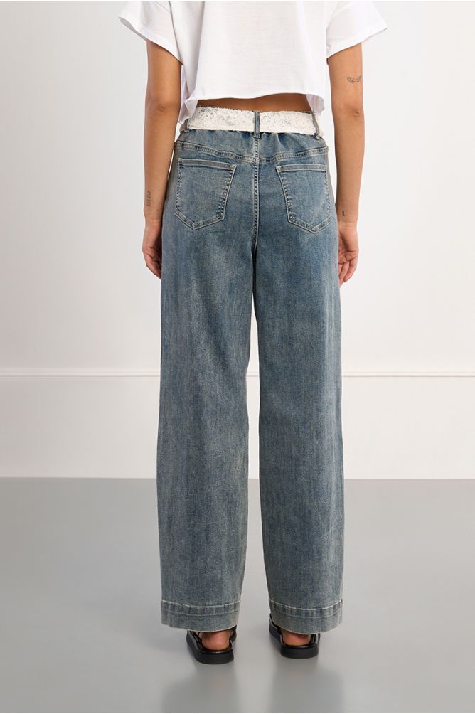 Pantalón de mujer largo, vaquero, con lazada.