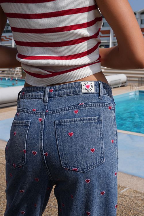 Cotton jeans with embroidered multi-hearts