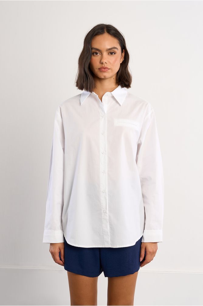 Camisa de mujer de manga larga, bolsillo frontal.